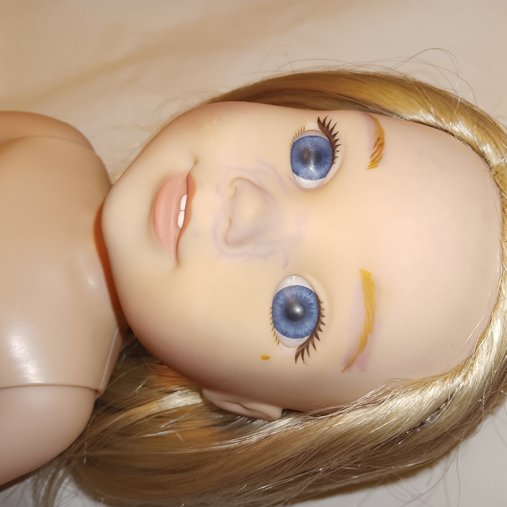 American Girl Doll with Blonde Hair and Blue Eyes